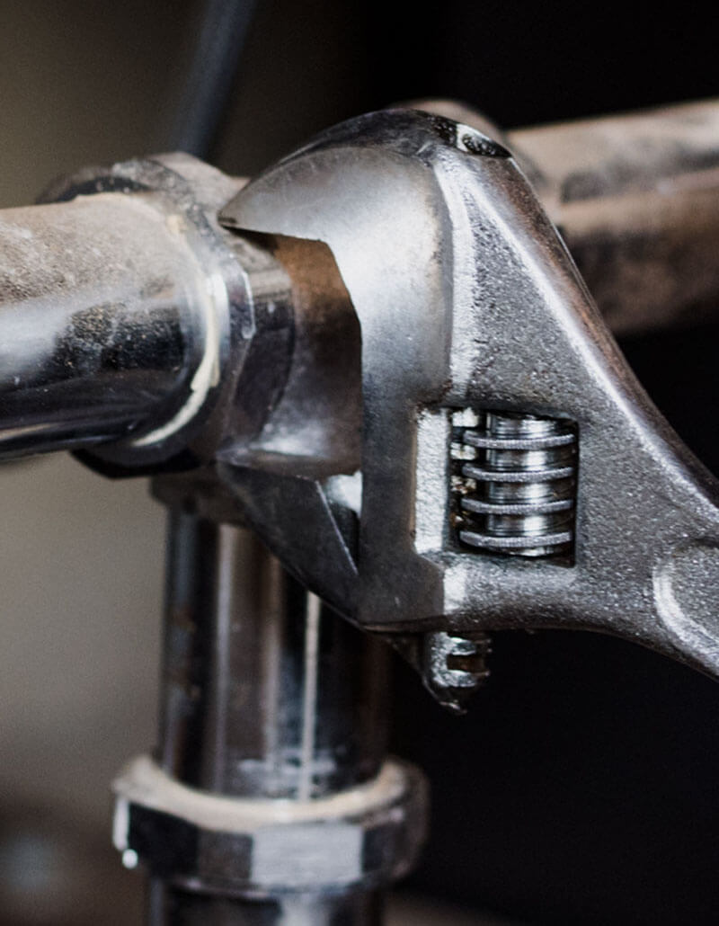 TAPS plumber repairing residential plumbing system in Houston TX home