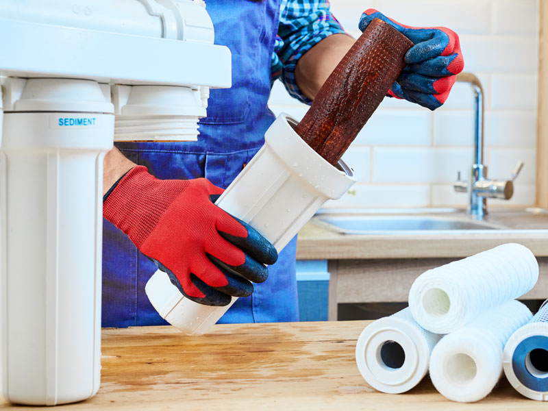Licensed Houston plumber from TAPS replacing residential reverse osmosis (RO) water filter tube