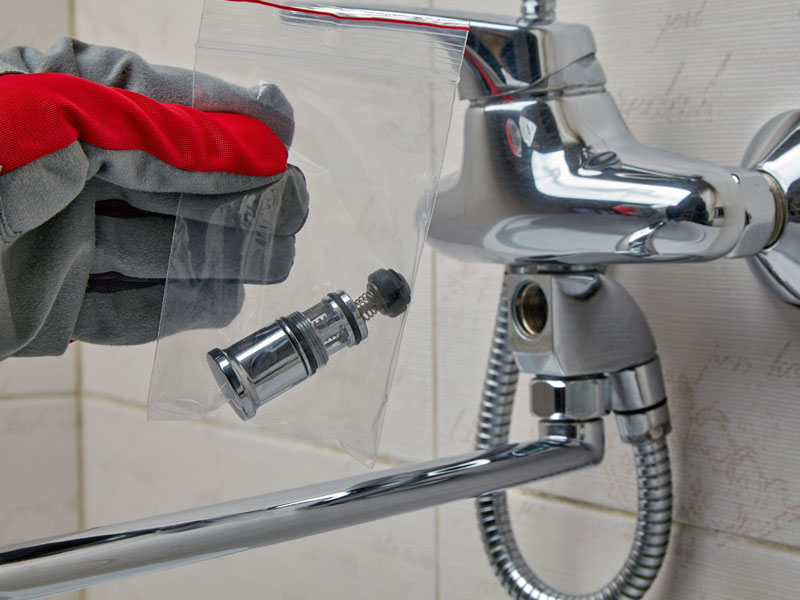 TAPS plumber holding shower valve replacement part